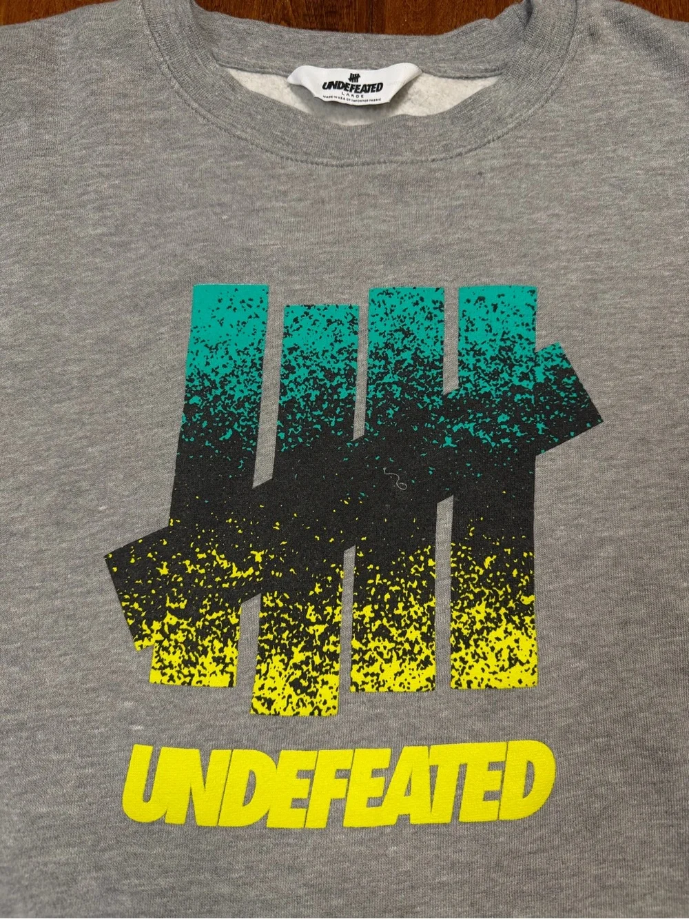 Undefeated Gray Crewneck with Teal, Black & Yellow Logo sz. L